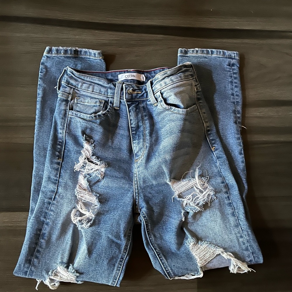 light blue high waisted ripped jeans.